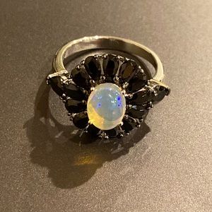 1.75ct Oval Ethiopian Opal 2.00ctw Black Spinel Rhodium Over .925 Ring - Size 8